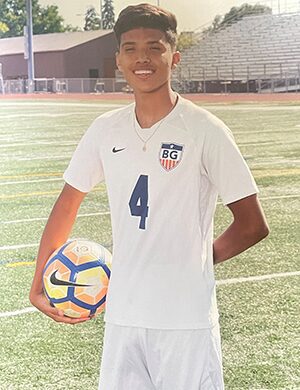 Rickey holding soccer ball