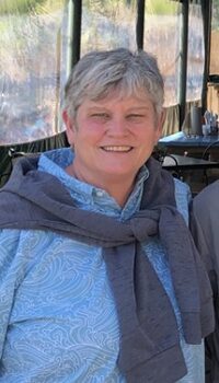 Carol Clay posing for picture